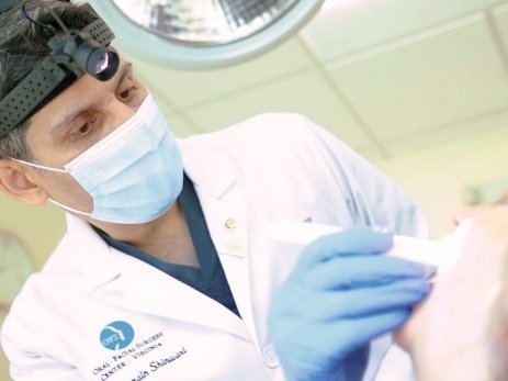 Doctor Shinwari providing oral surgery services